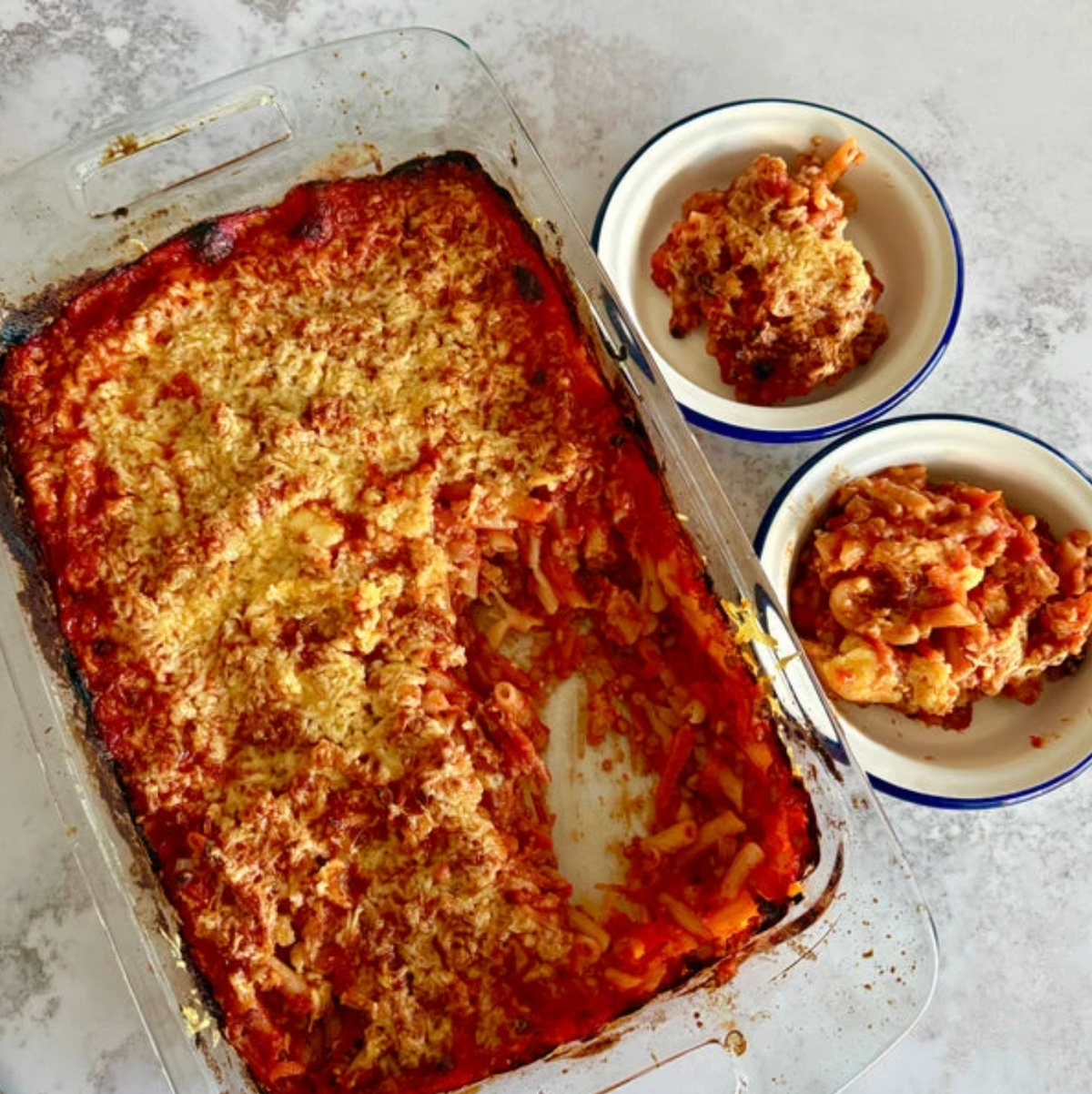 Mum Dump Lentil Bolognaise baked in one dish with a golden cheese top
