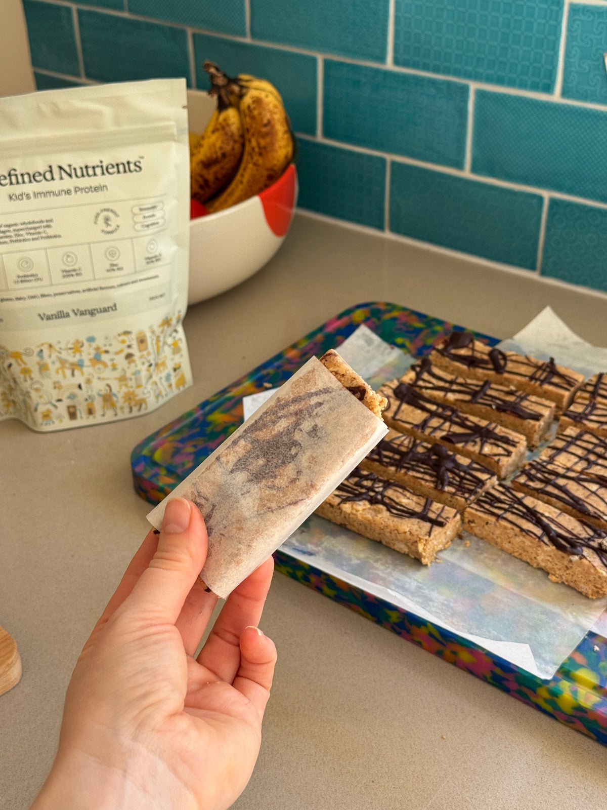 No-bake protein bars drizzled with dark chocolate
