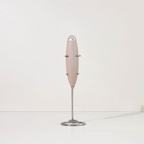 Unrefined Nutrients beige handheld battery mixer for clump-free protein shakes